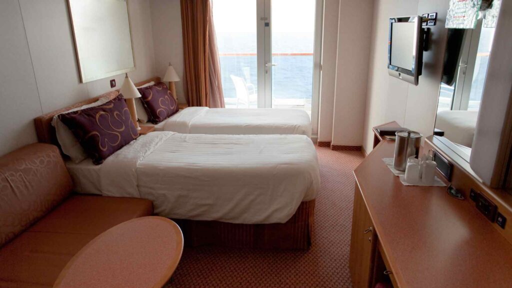 Image of two beds in a hotel room