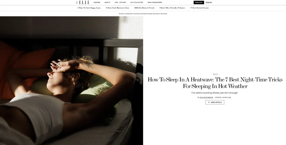 Woman lying in bed during hot weather, used for an article about sleeping in a heatwave.